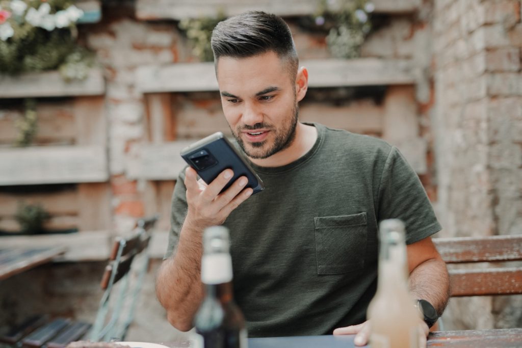 man doing voice search